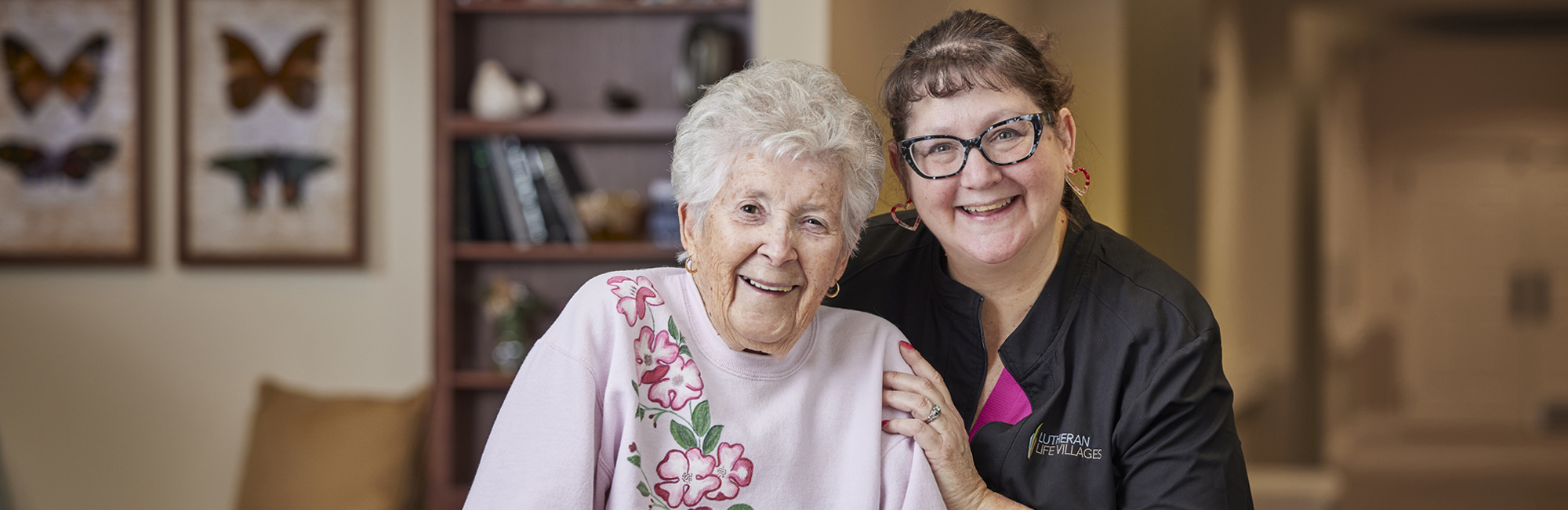 two lutheran life villages residents smiling at the camera used as the careers page headers